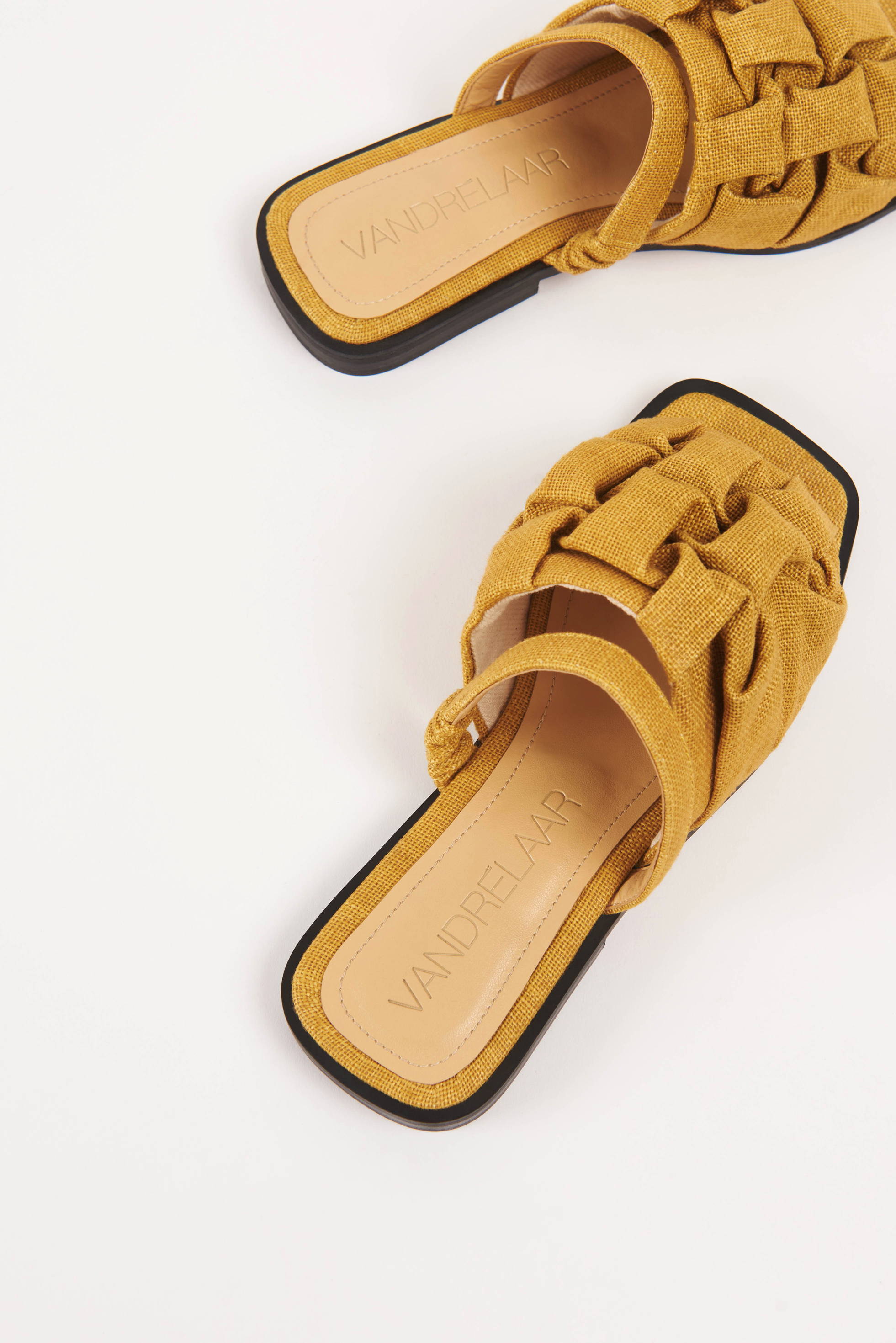 Pair of Vandrelaar vegan Simone sandals in mustard yellow linen