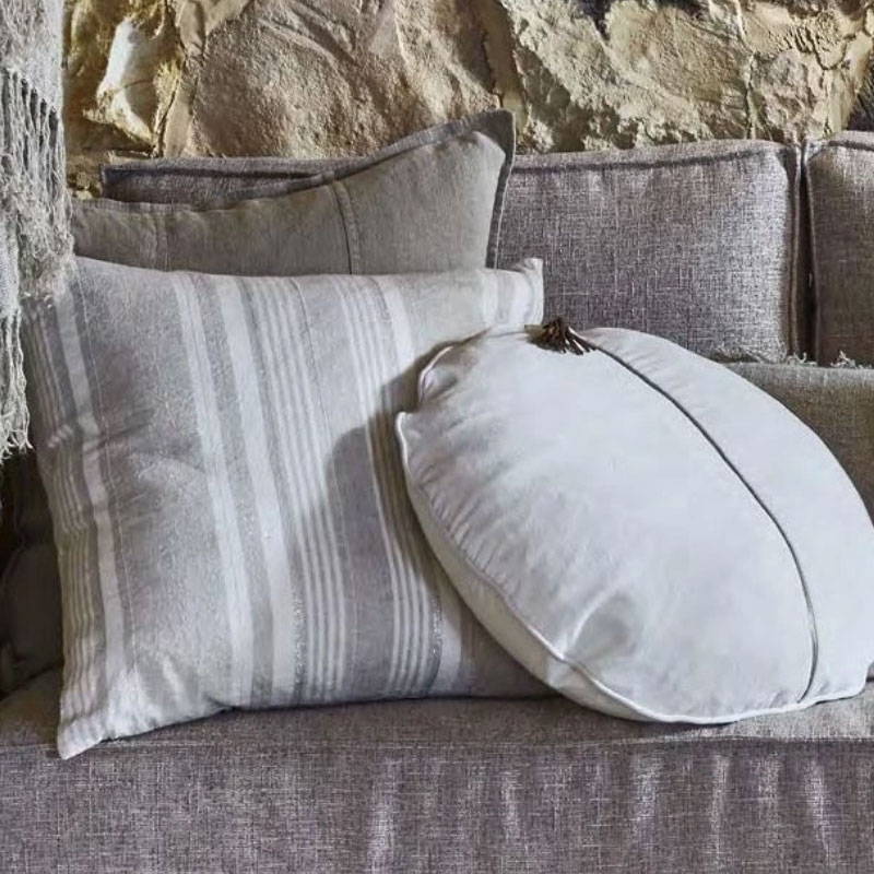 White Velvet Circlyn Cushions with the Dew Drop cushion on sofa