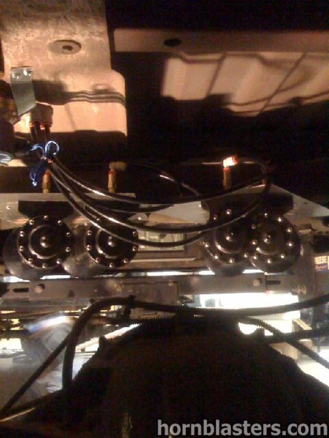 Alternate angle of Shocker XL horns brackets or chassis mounting on GMC Sierra photo 6