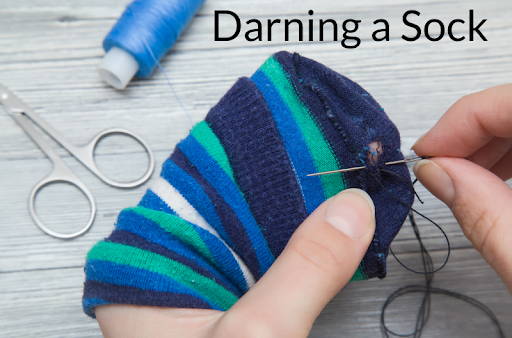 darning a sock