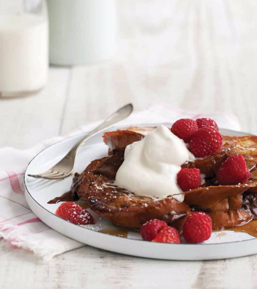 Chocolate Stuffed French Toast with berries on plate