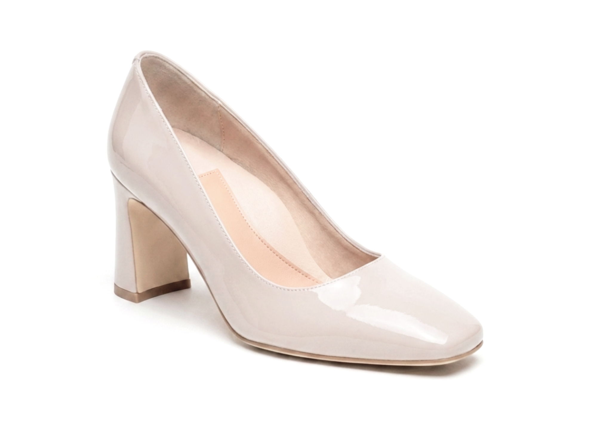 A beige high heel shoe with a chunky heel.