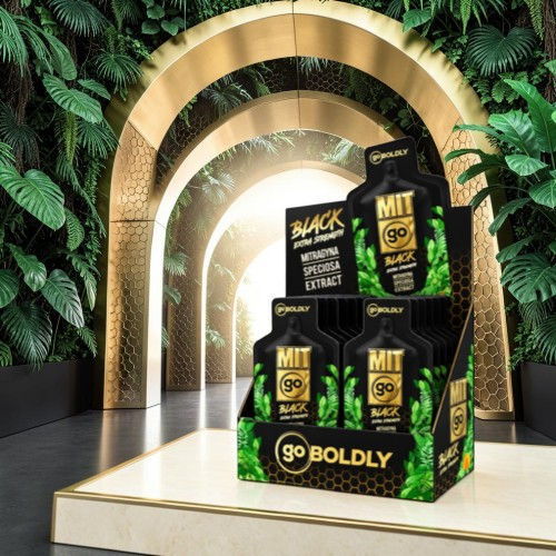 Display of product boxes in a lush, green environment with decorative arch.