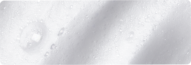 Abstract white background with water droplets and soft shadows.