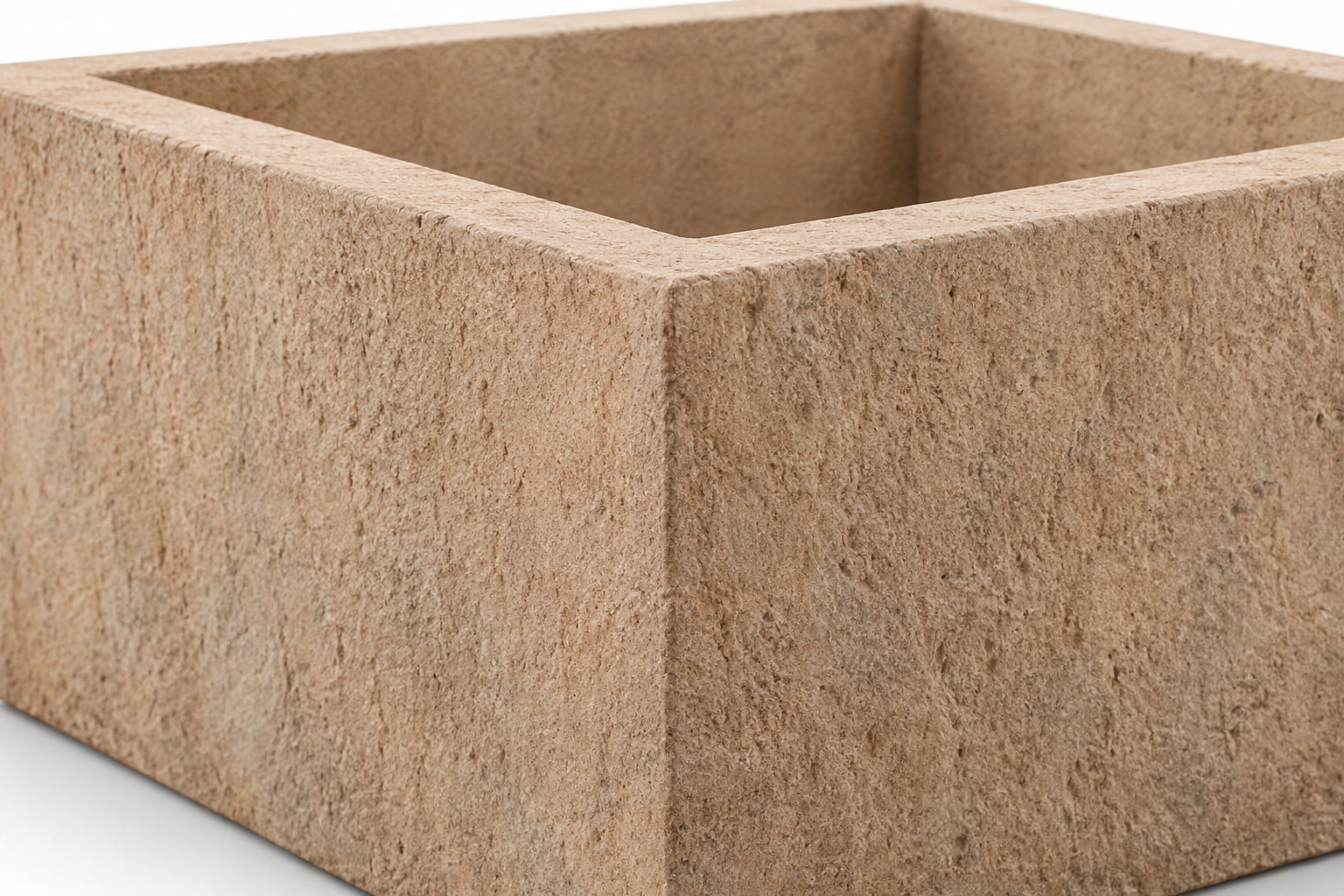 A square, textured, fiberstone planter with sharp edges.