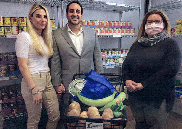 Ida and Mark Aramli (left) with Heather Hole Strout (right), the Executive Director of Newport's MLK Community Center. 