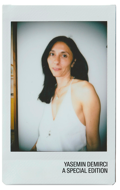 Portrait of a woman in a white dress, with text below.