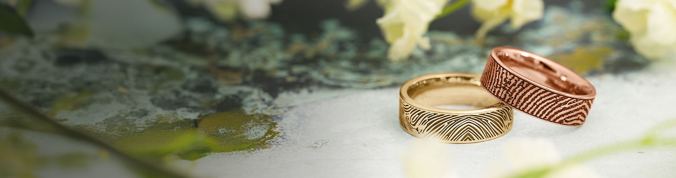 yellow and rose gold fingerprint rings