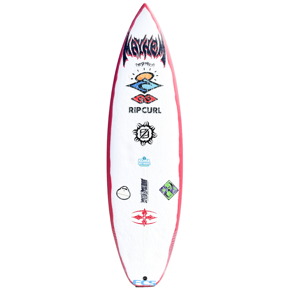 White surfboard with various stickers on it on a white background