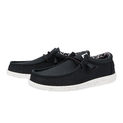 Black casual shoes with white soles and laces.
