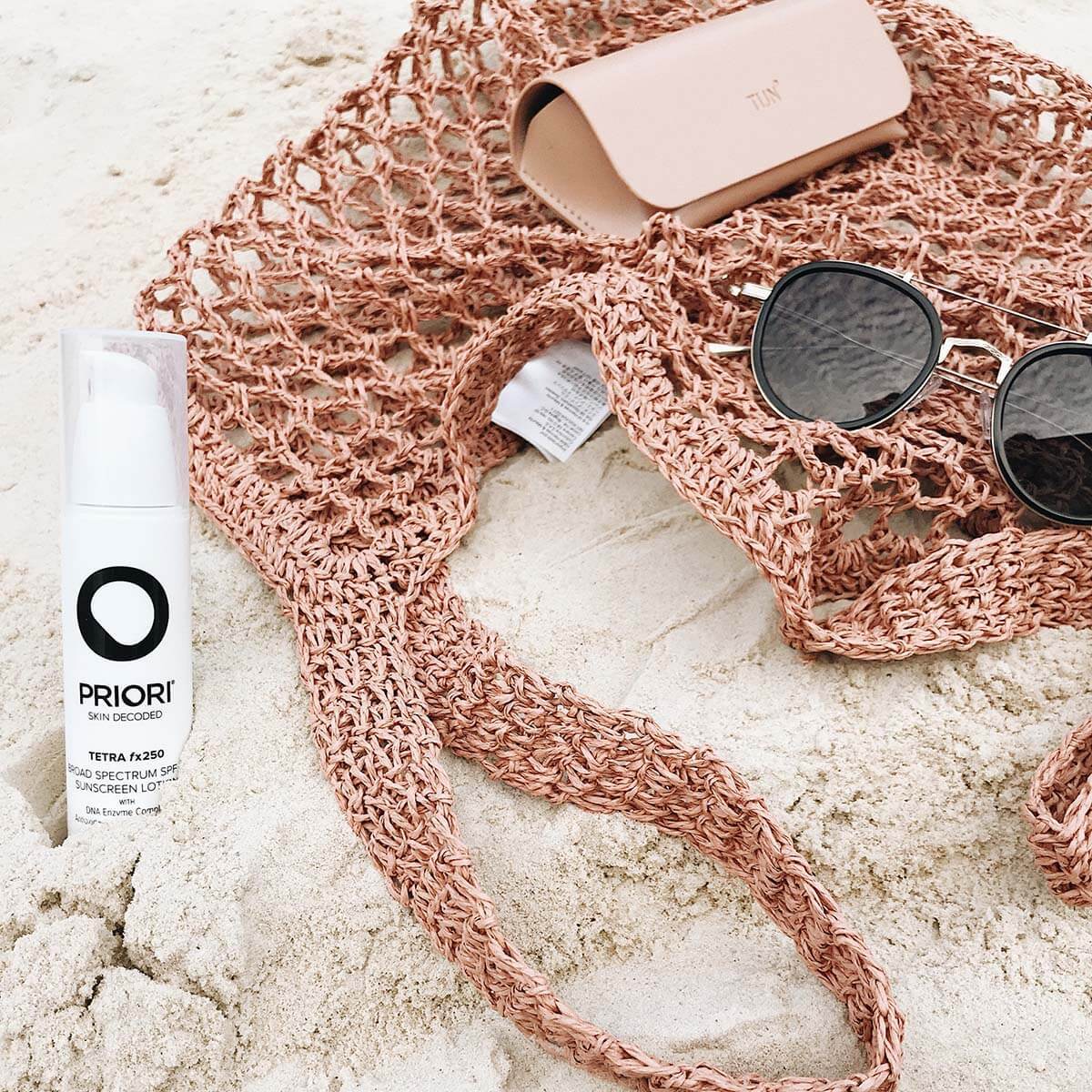 Priori Tetra Sunscreen on sand - Instagram picture