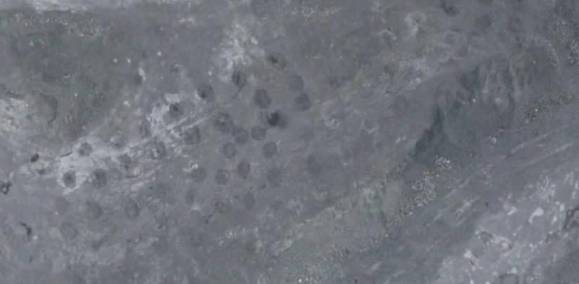 Aerial terrain survey of an open-pit mine for drill and blast planning