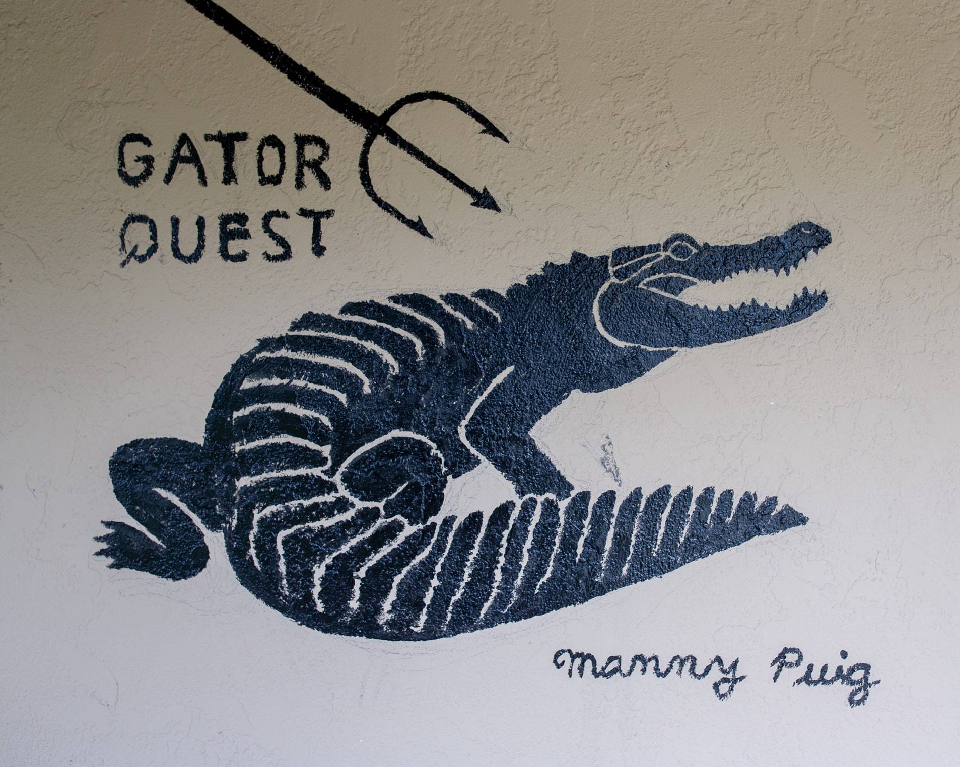 Gator Quest painted on wall