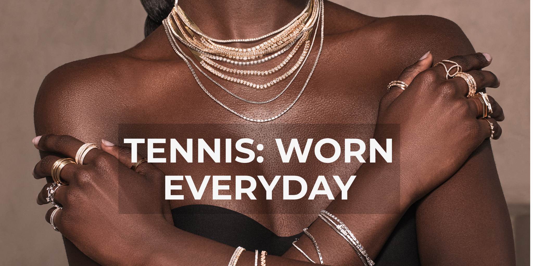 Woman showcasing layered jewelry with text 