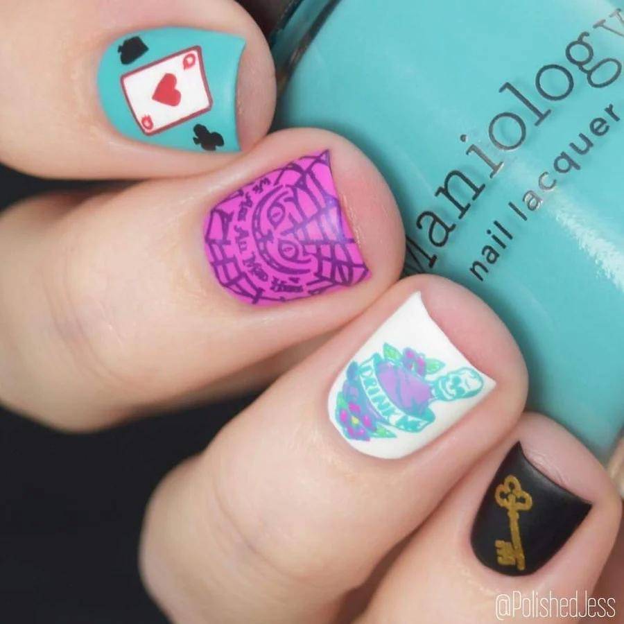 You will not need a steady hand for long when stamping two fingernails with cute halloween nail art from maniology
