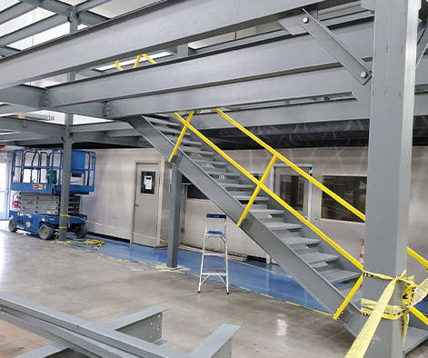 Cogan mezzanine during construction and installation.