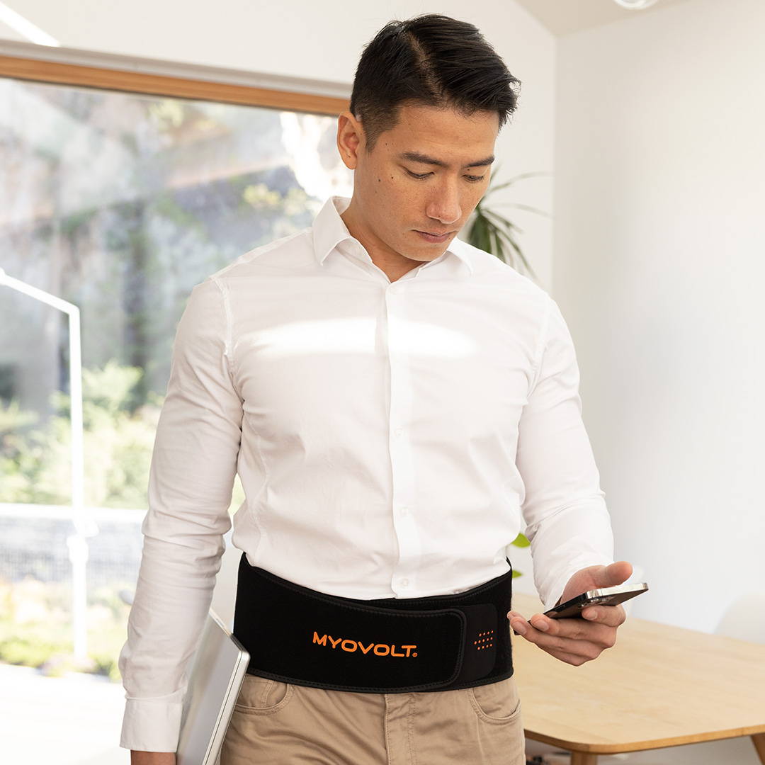 Myovolt vibration therapy back brace relieves muscle pain, tension and stiffness at work and home.