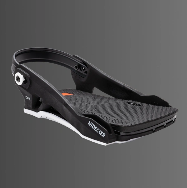 Black and white snowboard binding against a gray background.