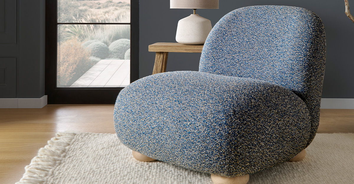 Kinsale blue boucle fabric pebble seat by Vogue Williams