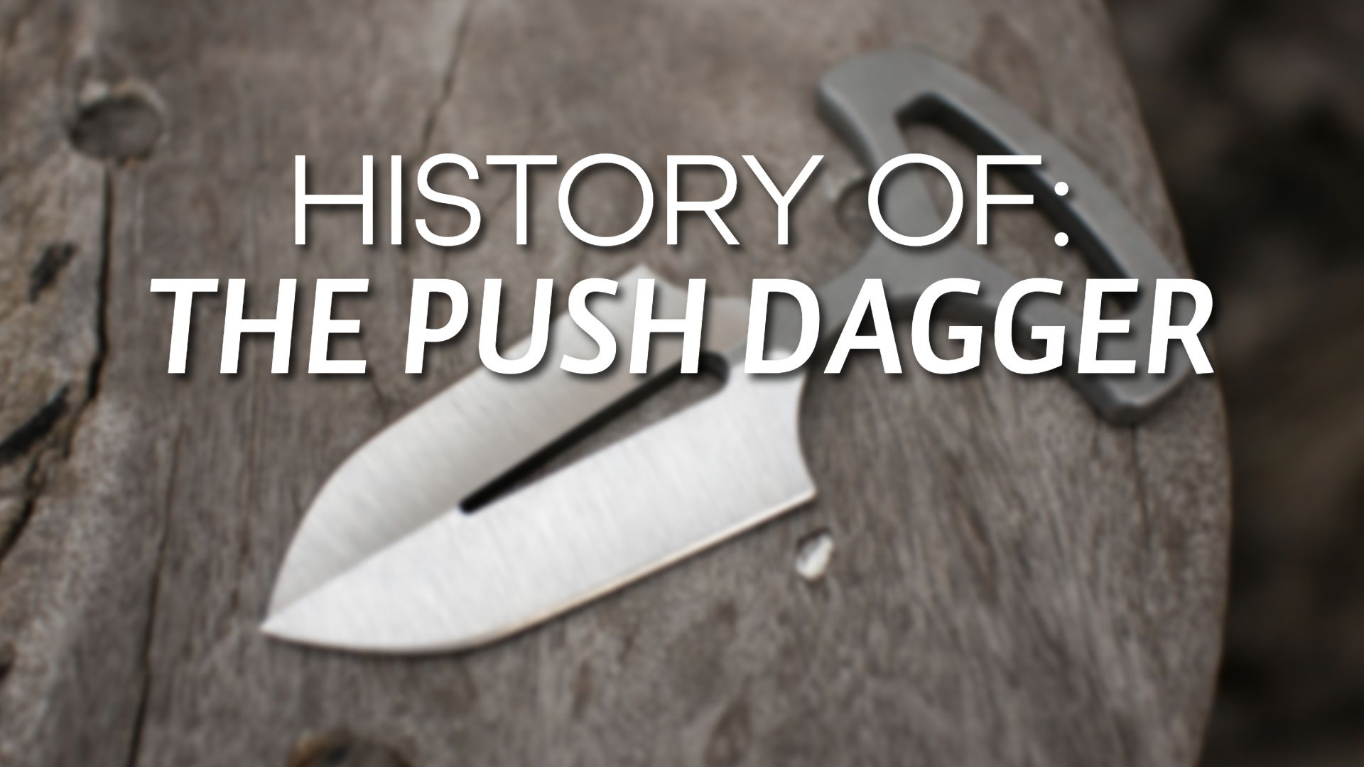 Image of a push dagger with text 