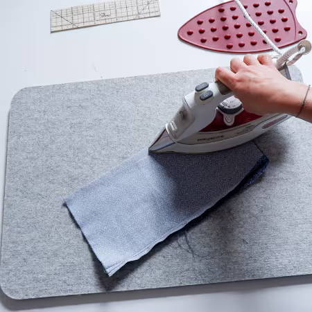 ironing on a wool pressing mat