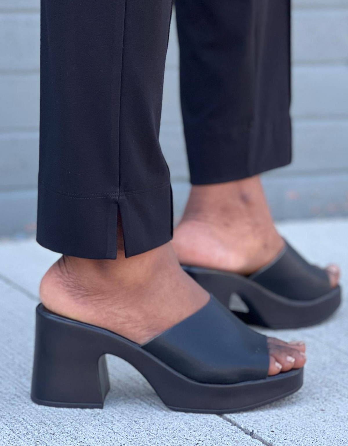 Close up of the side slits of Miik's Christal pull-on pintuck ankle pant