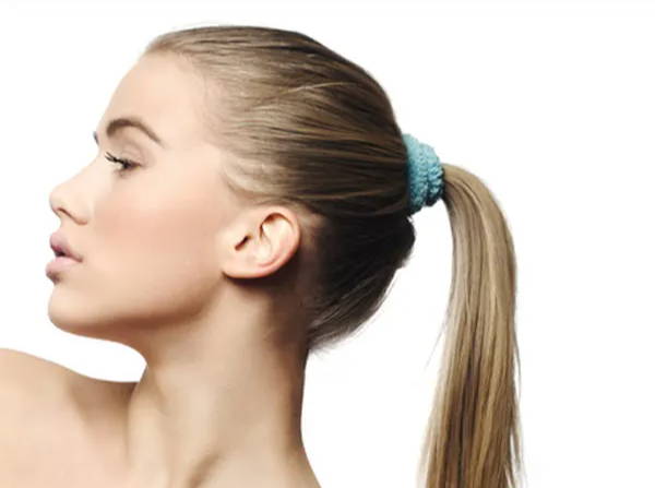 secure your hair with a silk scrunchie