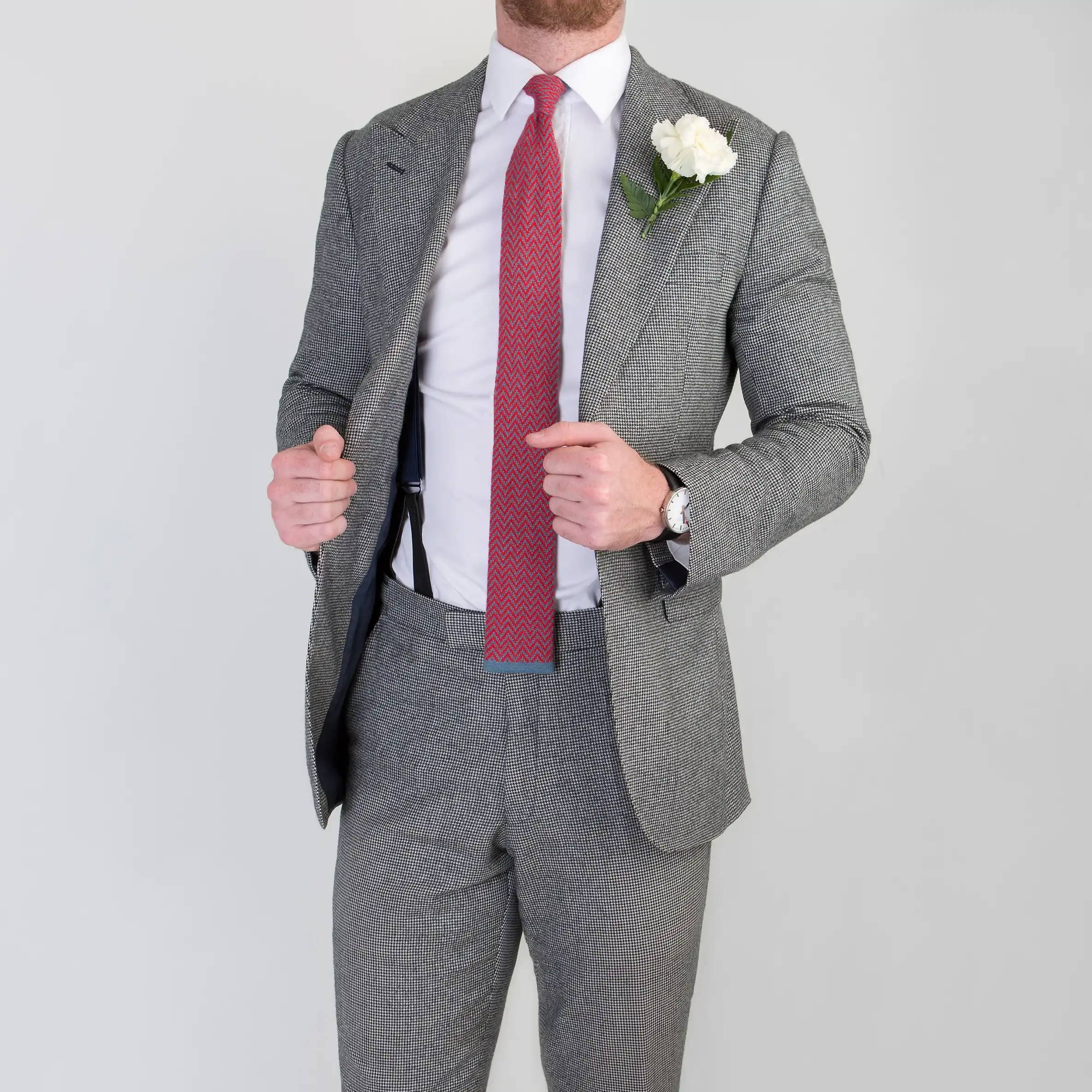 Gentleman wearing single breasted wedding suit by bespoke tailors Mullen and Mullen