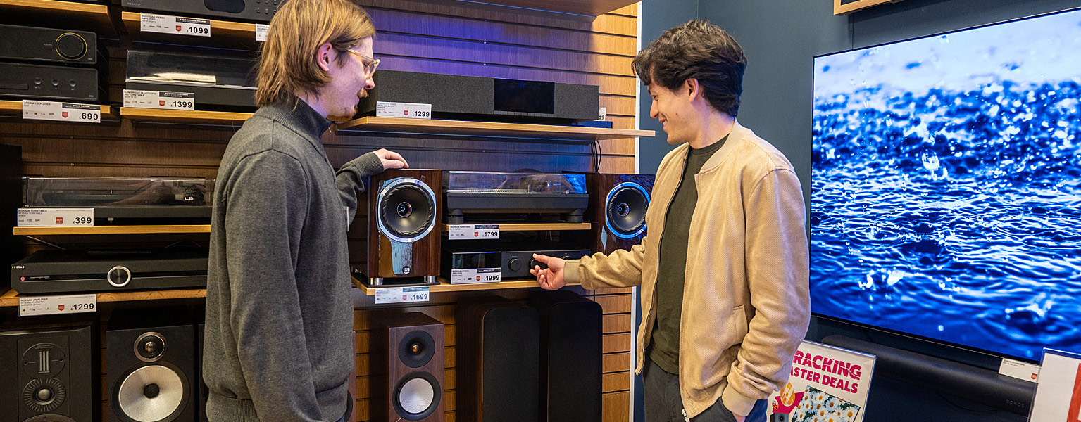 A colleague discussing hi-fi systems with a customer in one of our stores.