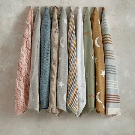 Nine assorted patterned arranged in a row on a neutral background.