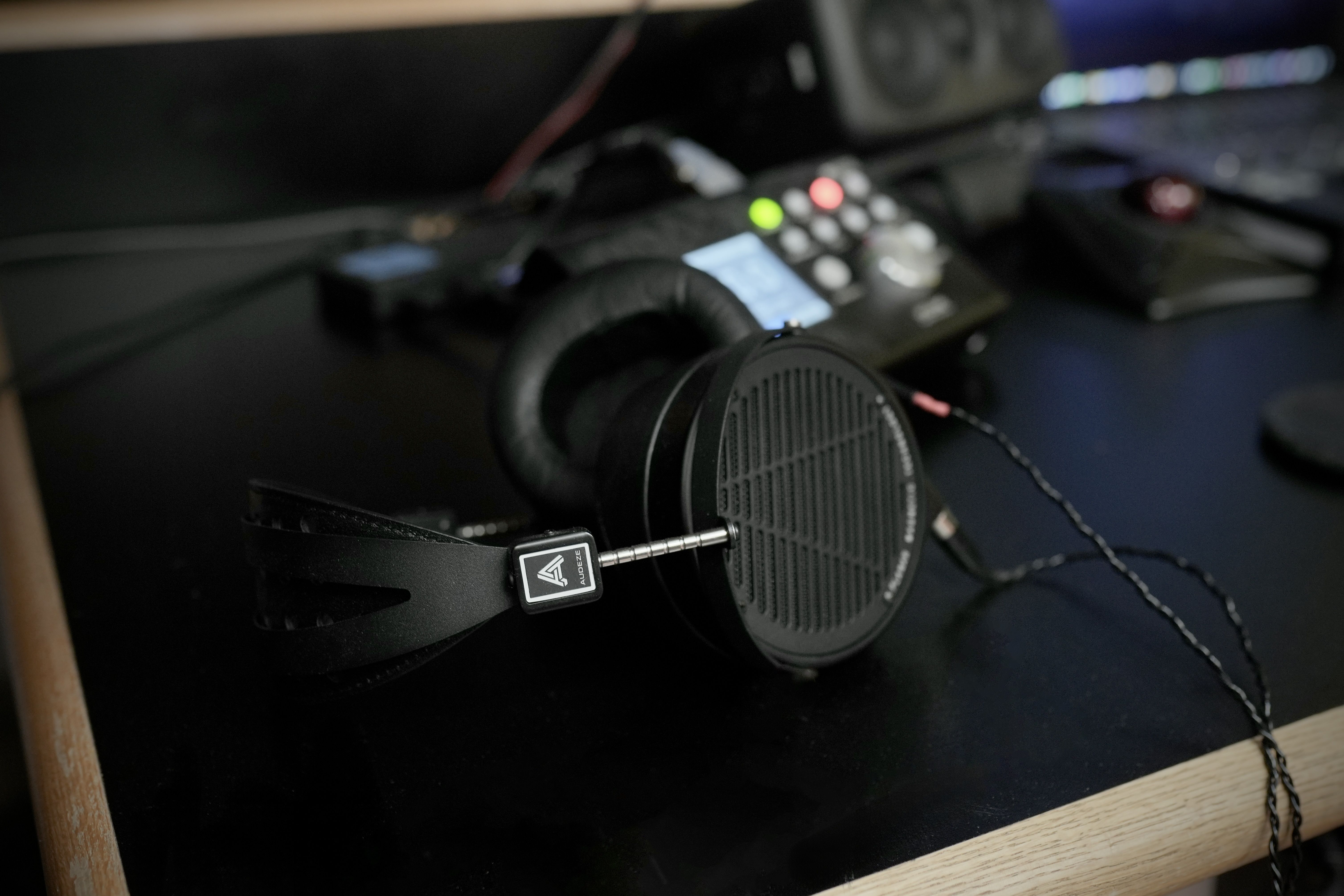 Audeze LCD-X headphone lying on table in the studio