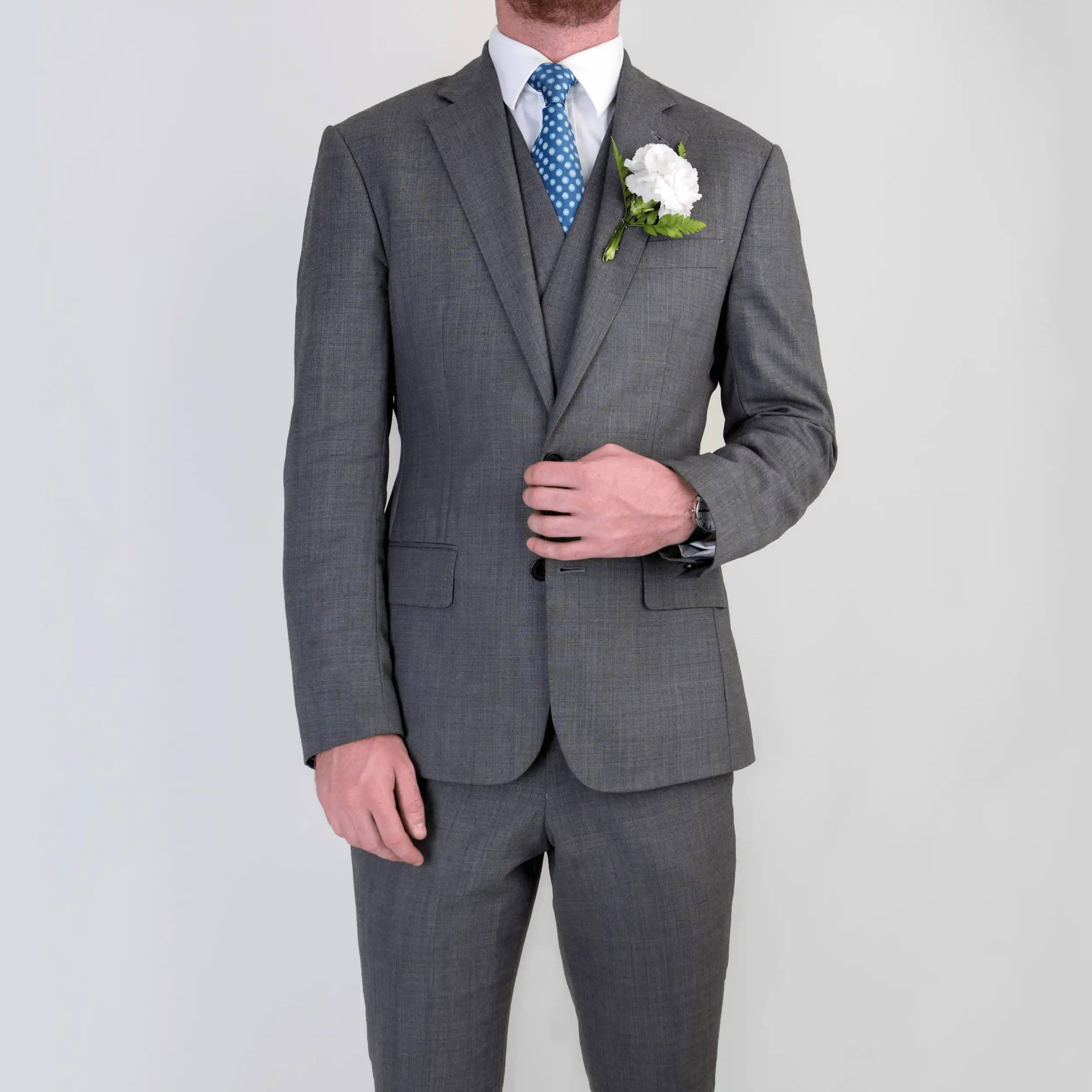 Bespoke three piece wedding suit with waistcoat tailored by Mullen and Mullen