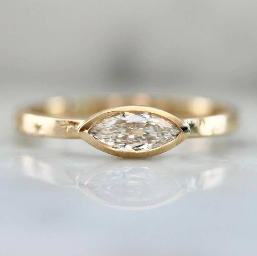 diamond-moval-ring-engraved-gold-band