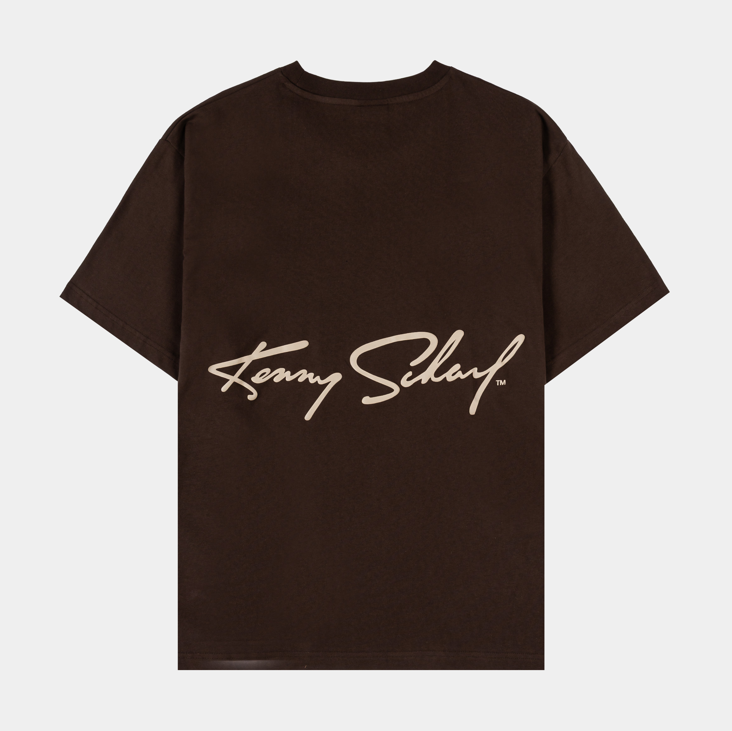 Brown t-shirt featuring various graphic designs and embroidered text.