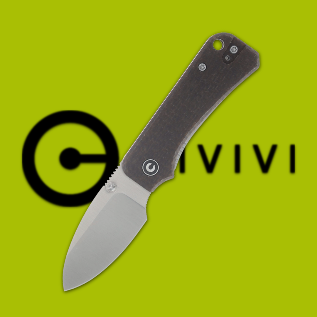Folding knife with a gray handle against a green background.