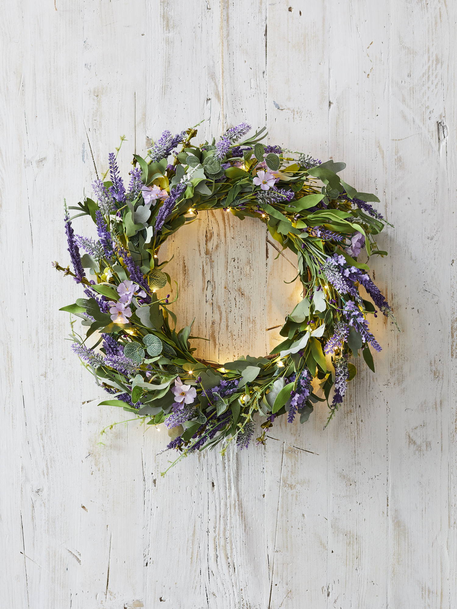 Lavender spring wreath illuminated with micro lights