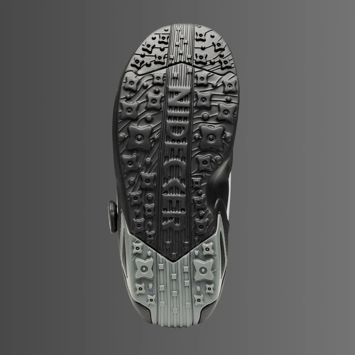 Sole of a shoe with textured grip pattern.