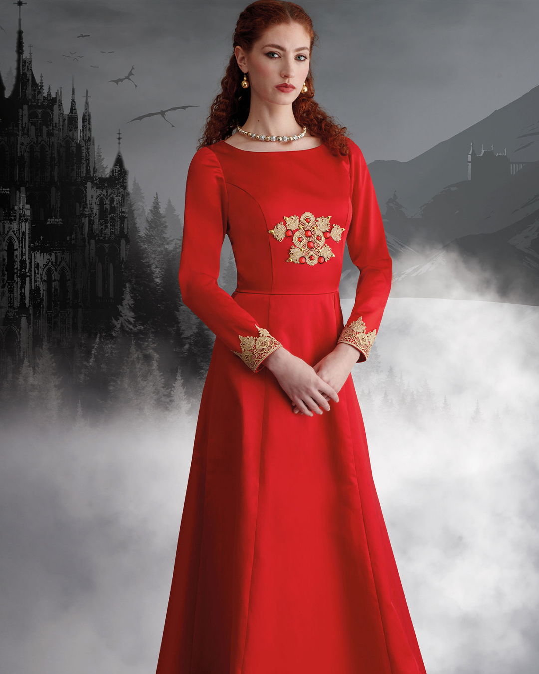 Woman in a red dress with floral design, standing against a misty background.