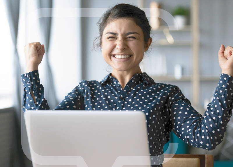 person celebrating infront of laptop screen