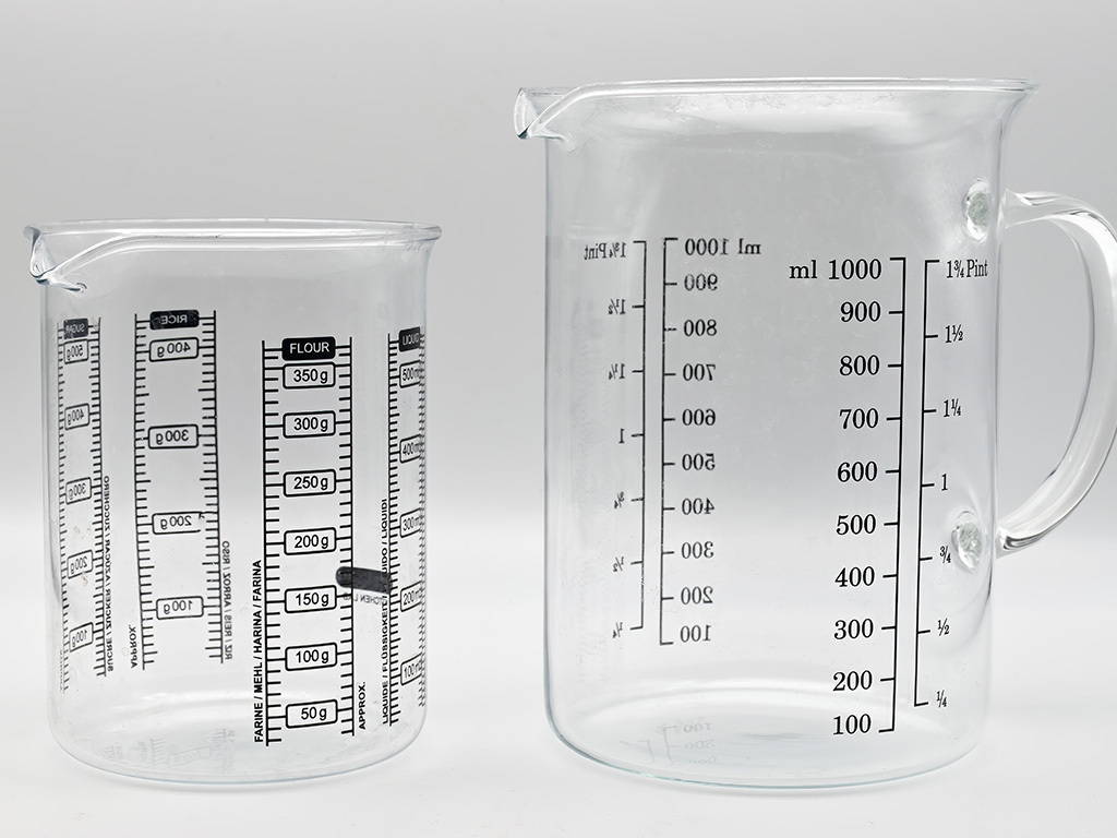 A photo of glass measuring beakers.