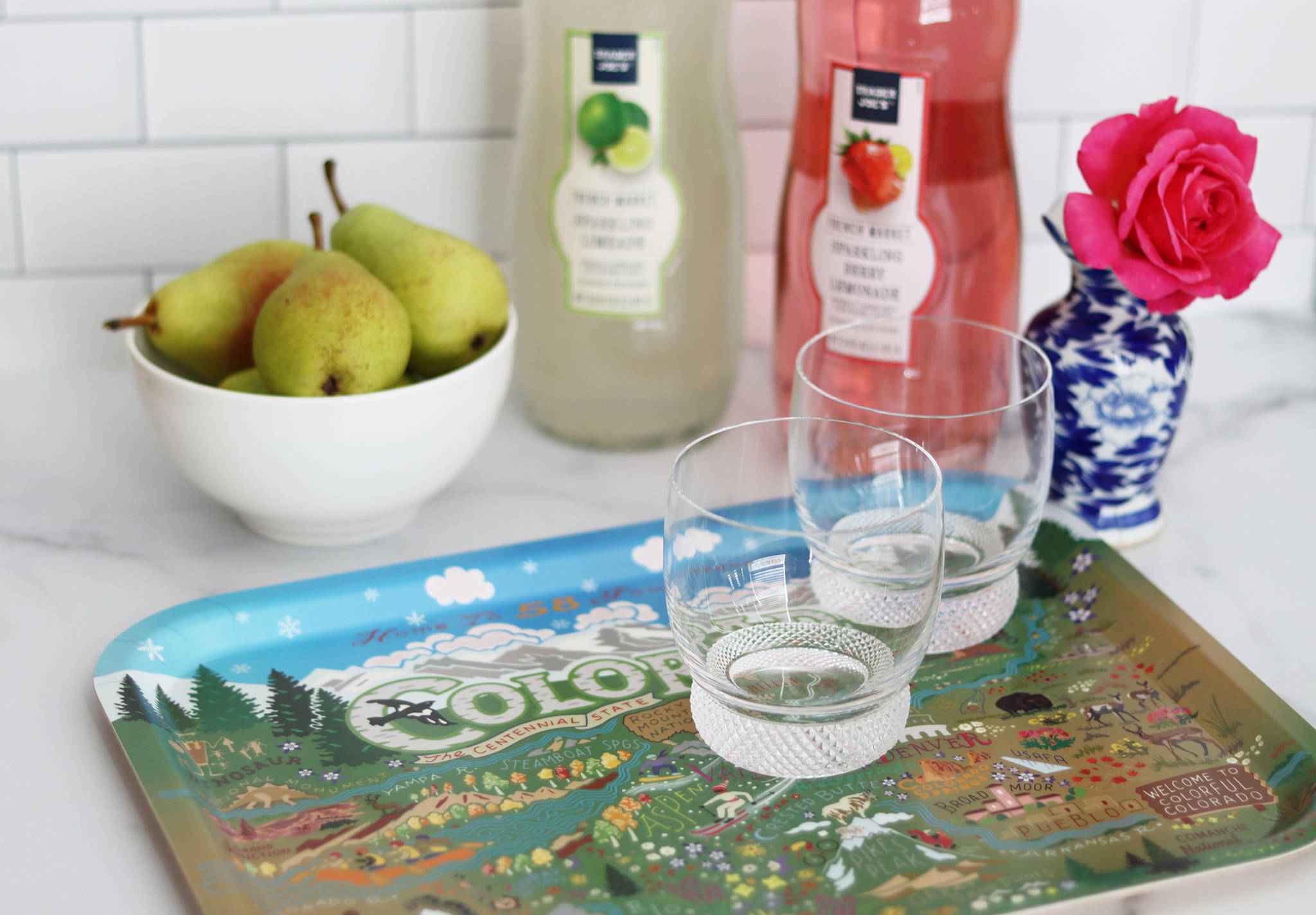 Colorado printed serving tray with fruit, glasses, and juice