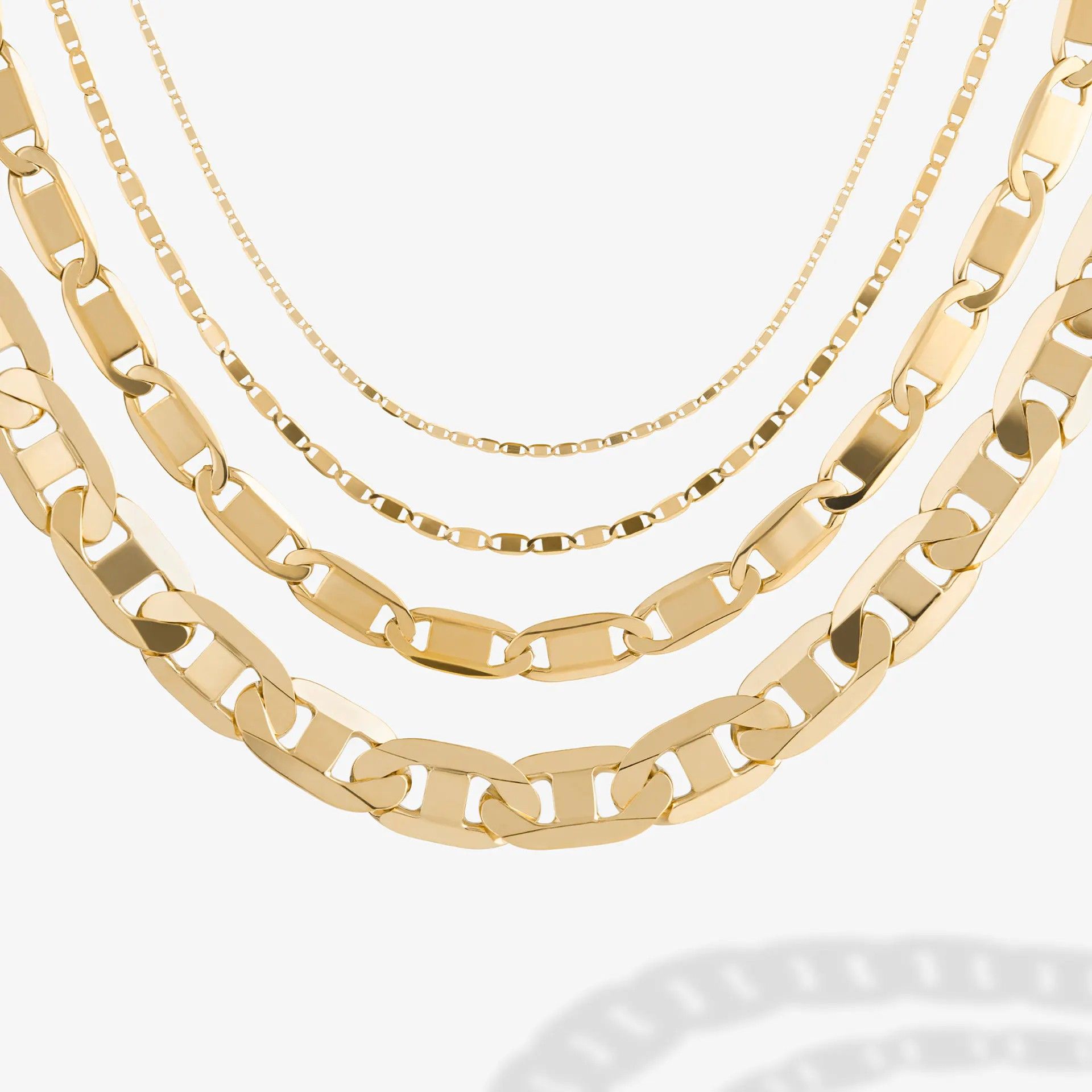 four chains varying in thickness.