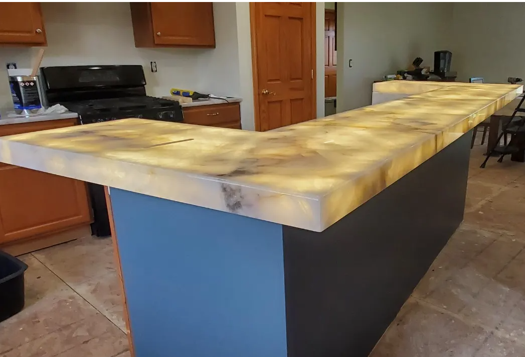 Backlit onyx kitchen countertop with LED strip lights