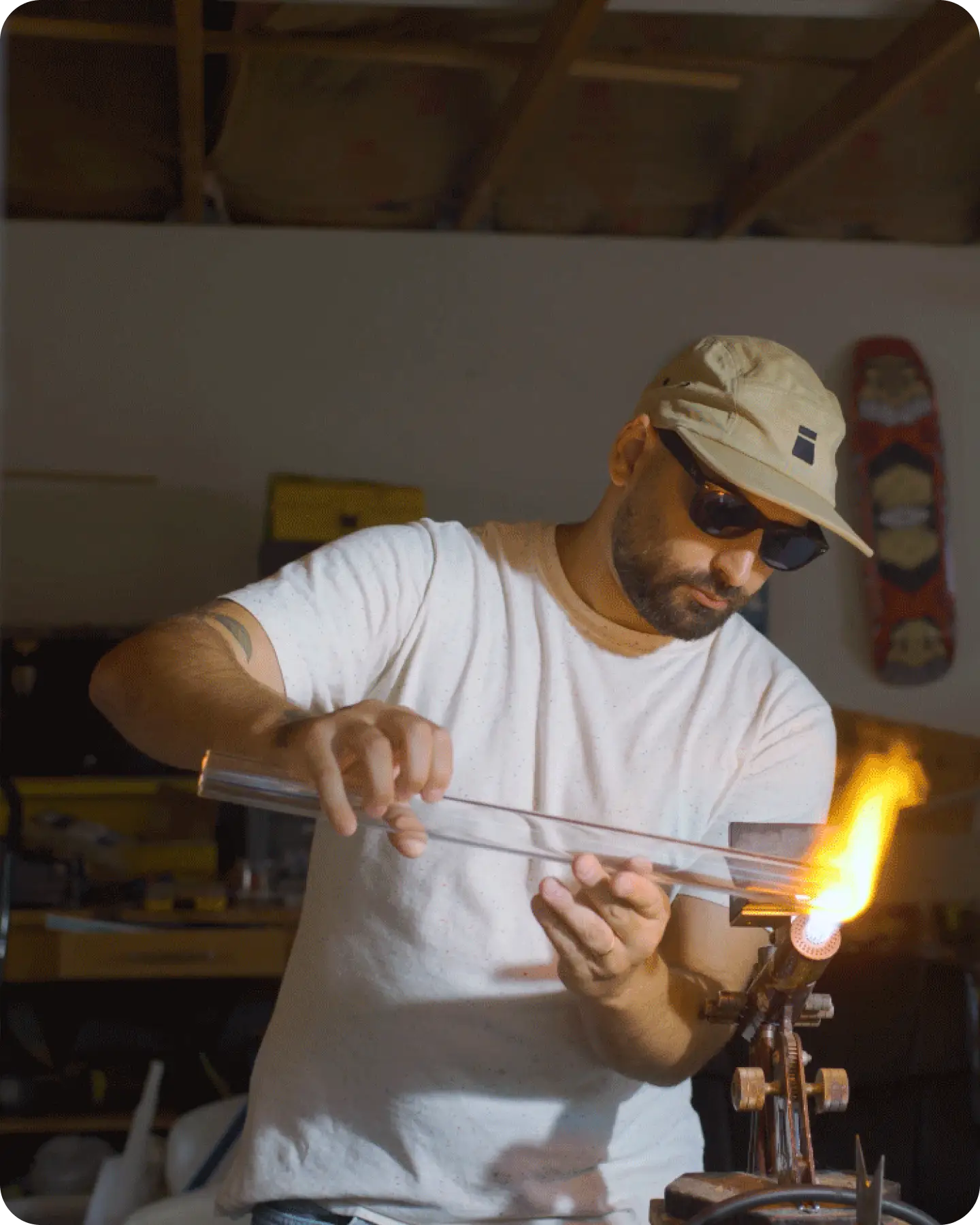 Etai Rahmil, founder of Pure Over, working glass at the torch