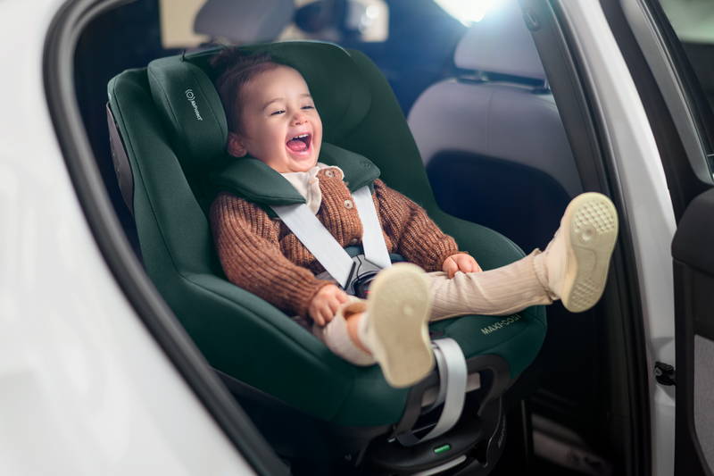 Toddler sitting in a Maxi-Cosi Pearl 360 Pro Car Seat