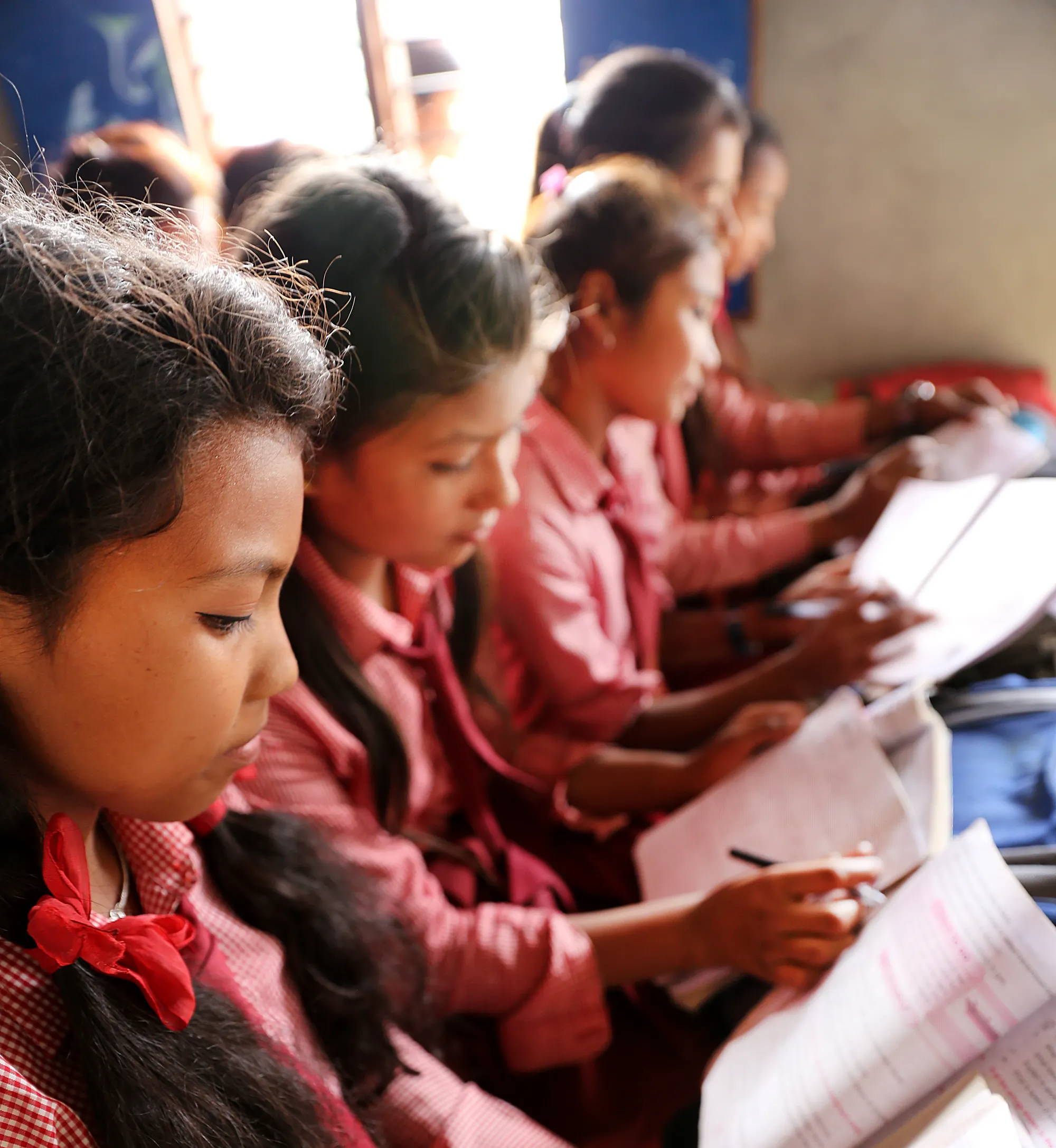 Girls in school learning.