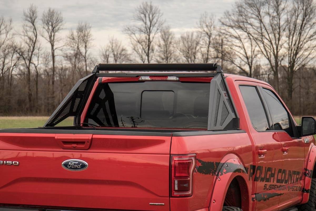 GM Sport bar on red truck