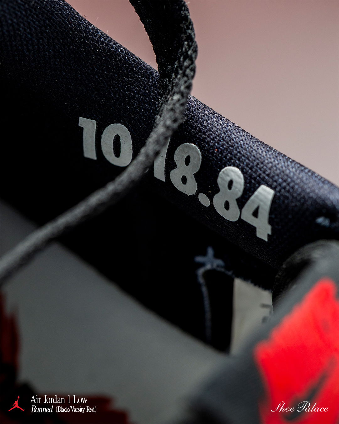 Close-up of a shoe tag displaying the date 10.18.84.