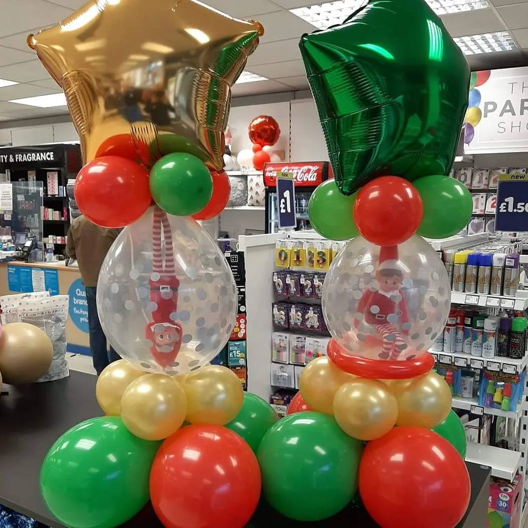 Elf and Christmas balloons
