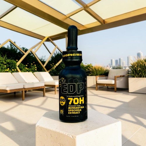Bottle of supplement on a table by outdoor seating area.